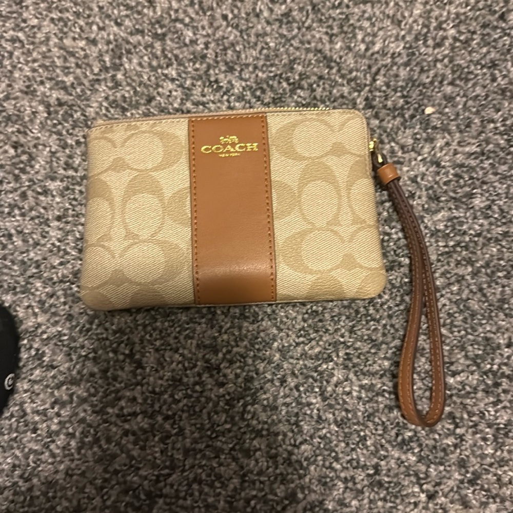 Tan leather coach wristlet